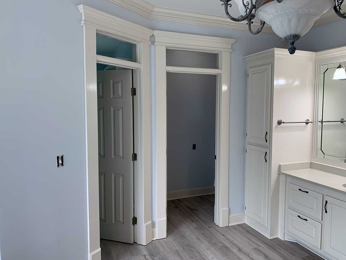 Repair Masterz master bath remodel sink cabinets and closet.